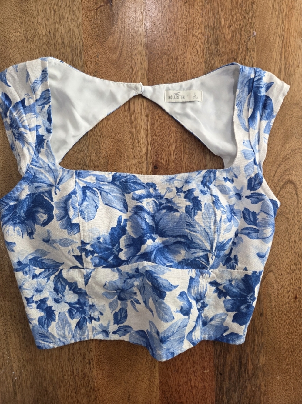 Hollister White Top with Blue Floral Accents